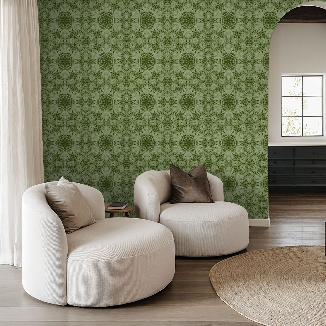 Olive botanical wallpaper in modern living room with white chairs.