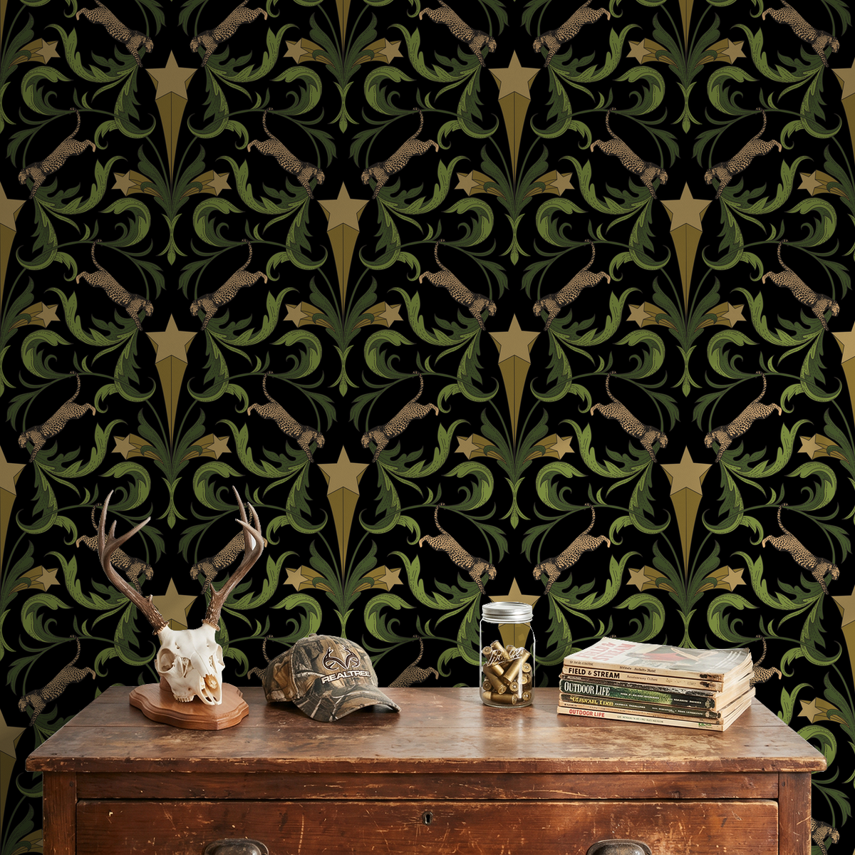 Hollywood Regency Onyx wallpaper with leopards, stars, and green leaves on onyx