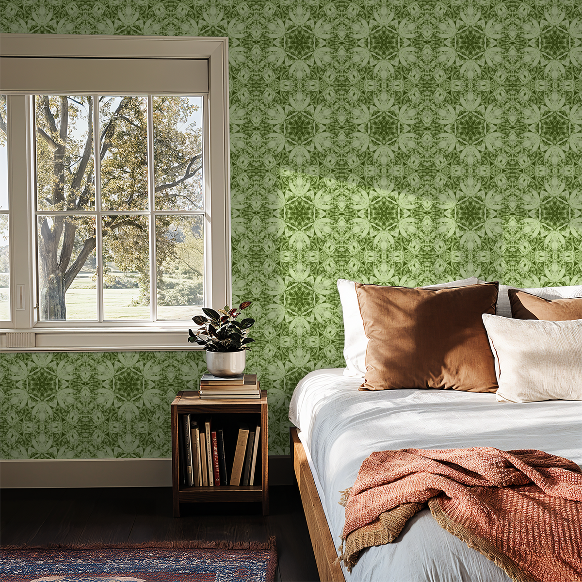 Olive green botanical wallpaper in cozy bedroom with window view.