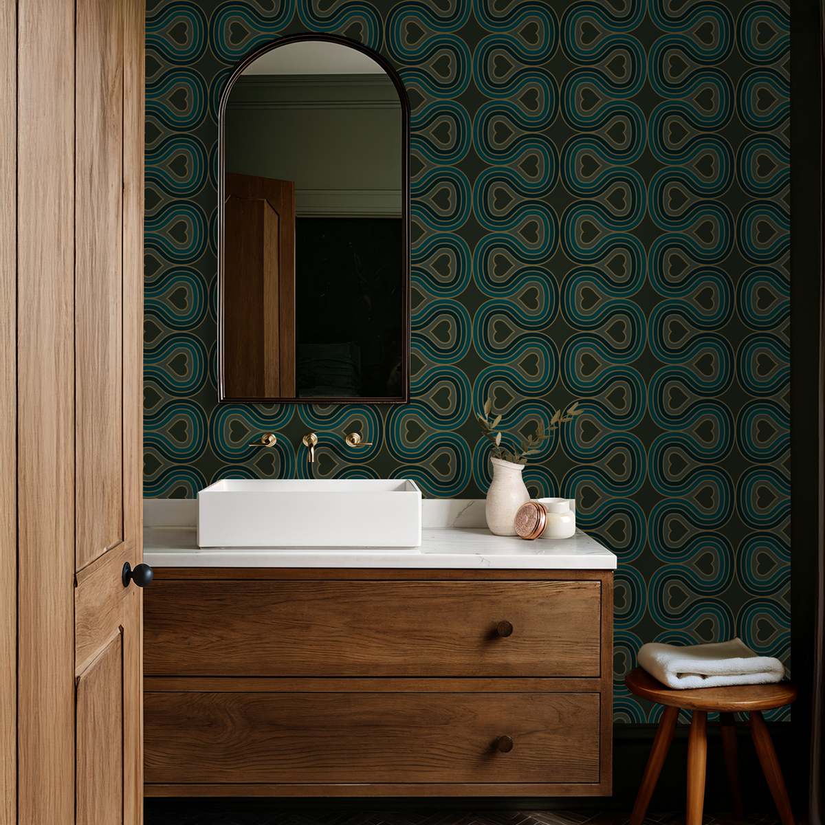 Retro heart pattern wallpaper in bathroom with wooden vanity and mirror.
